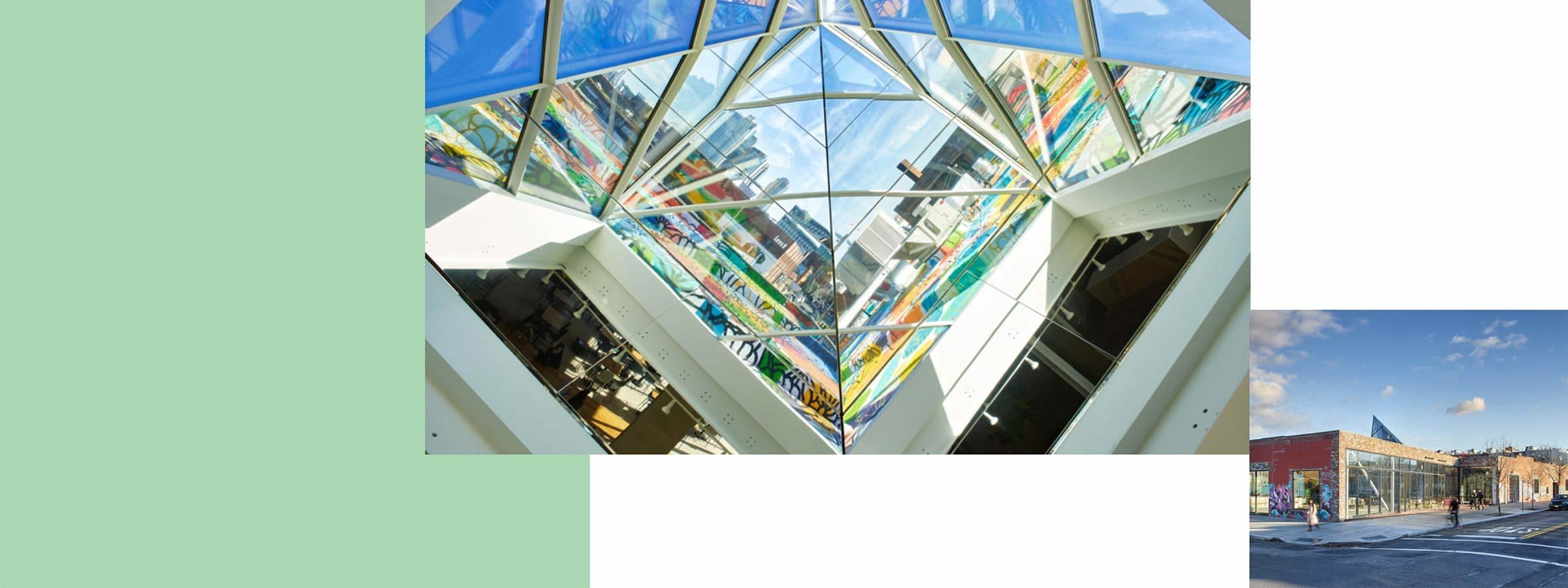 An indoor view of a colorful, triangular glass skylight with an outside cityscape visible through it. Adjacent is an outdoor street view featuring a corner building with a mural and several pedestrians under a clear blue sky with a few clouds.
