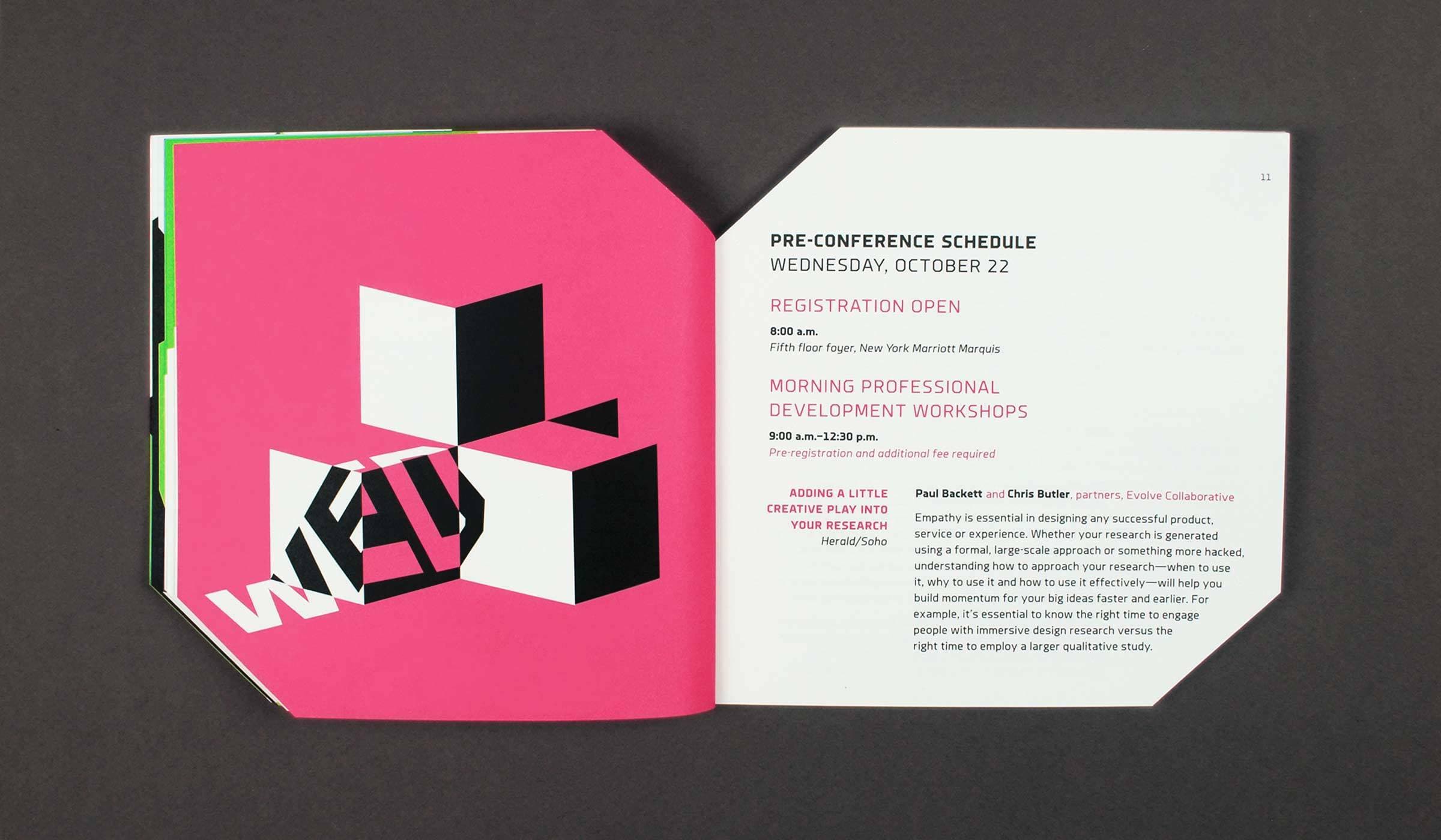 An open book showing a two-page spread. The left page features an abstract geometric design with black, white, and red shapes. The right page lists a pre-conference schedule for Wednesday, October 22, detailing registration and morning professional development workshops.