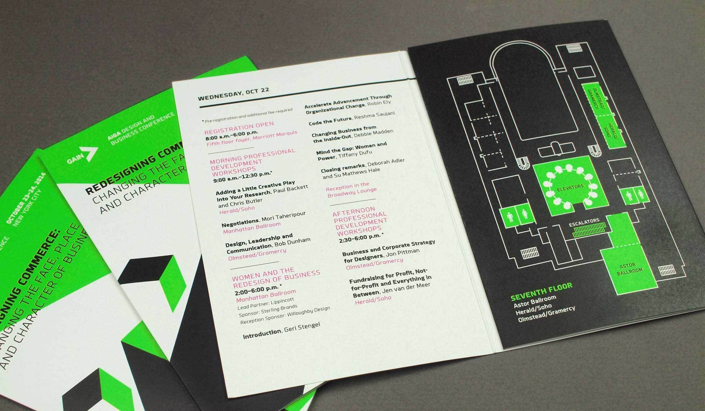 A conference agenda booklet is open, showing a detailed schedule on the left page and a venue floor plan on the right page in green and white. Additional booklets are partially visible in the background.