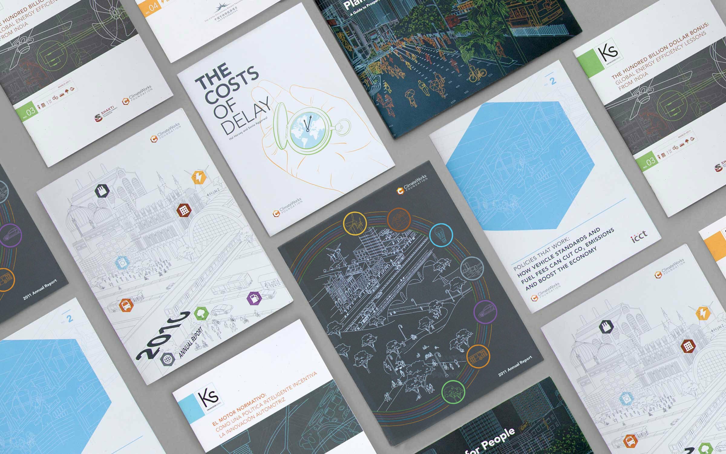An assortment of brochures and booklets laid out on a flat surface. Each cover features various designs, including illustrations, text, diagrams, and colorful graphics. The publications appear to be related to infrastructure, planning, and project management.
