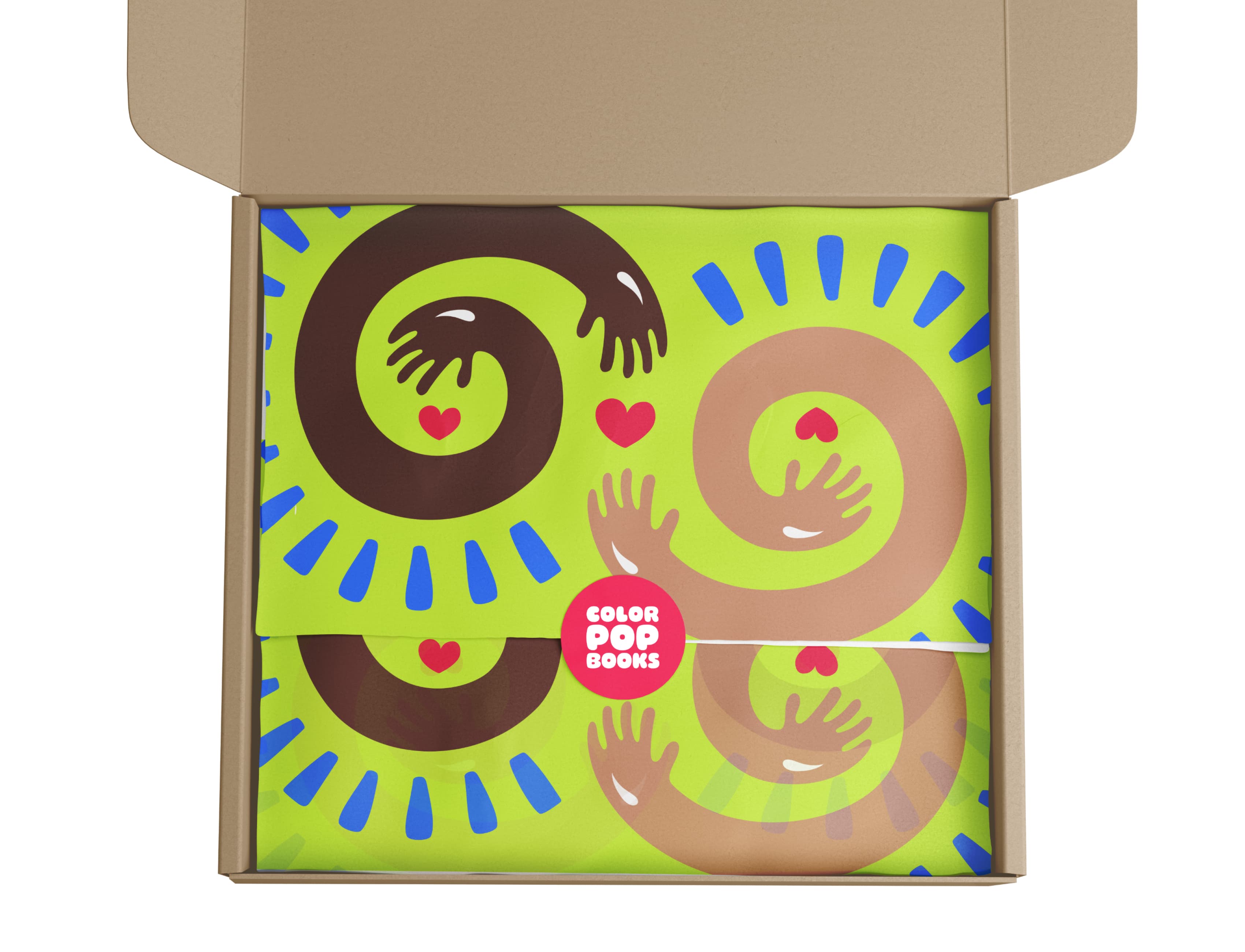 A cardboard box is opened to reveal colorful wrapping paper with an abstract design. The design features hands in various shades of brown and tan, forming spiral shapes with hearts, and blue lines radiating outward. A round pink sticker reads "COLOR POP BOOKS.