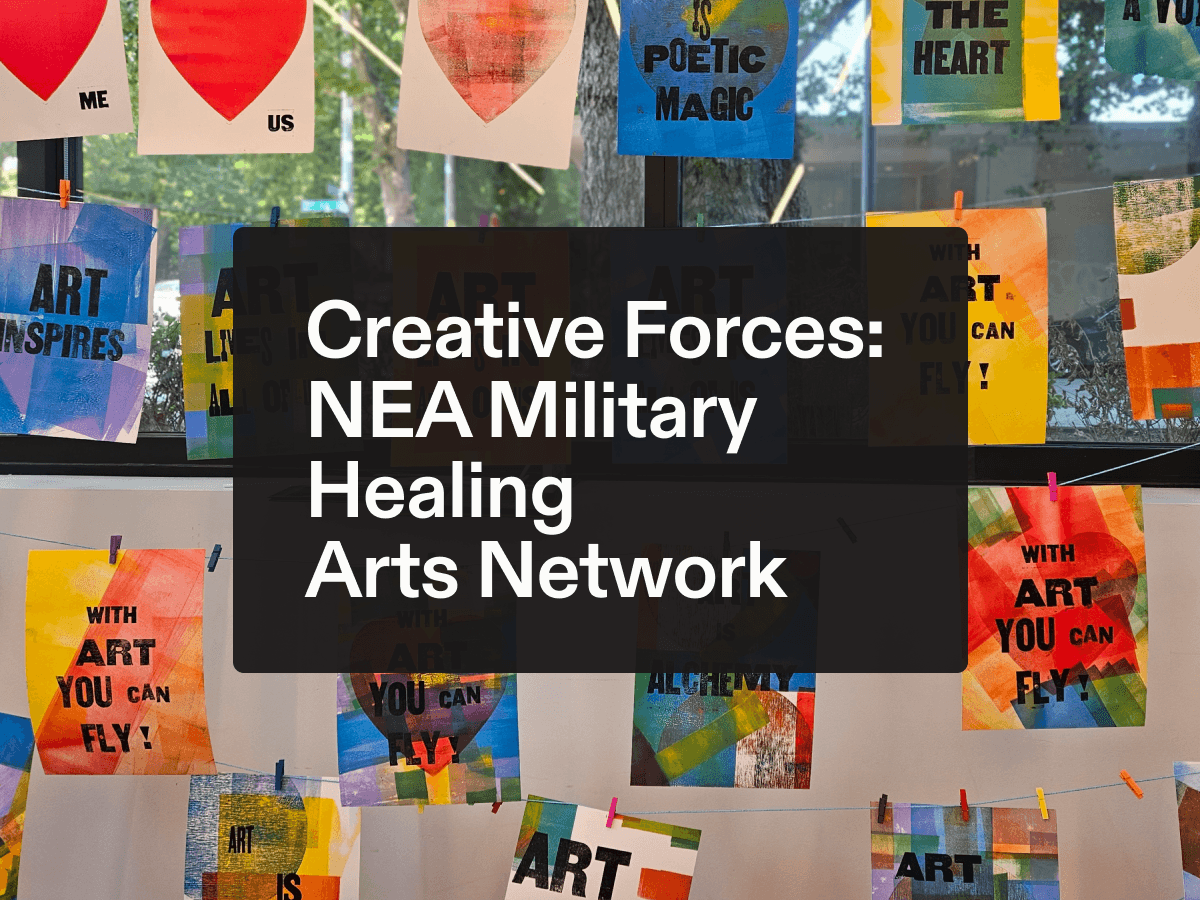 A display of colorful art prints with inspirational messages. A black box overlays the image with the text "Creative Forces: NEA Military Healing Arts Network" in the center. Bright colors and phrases fill the background.