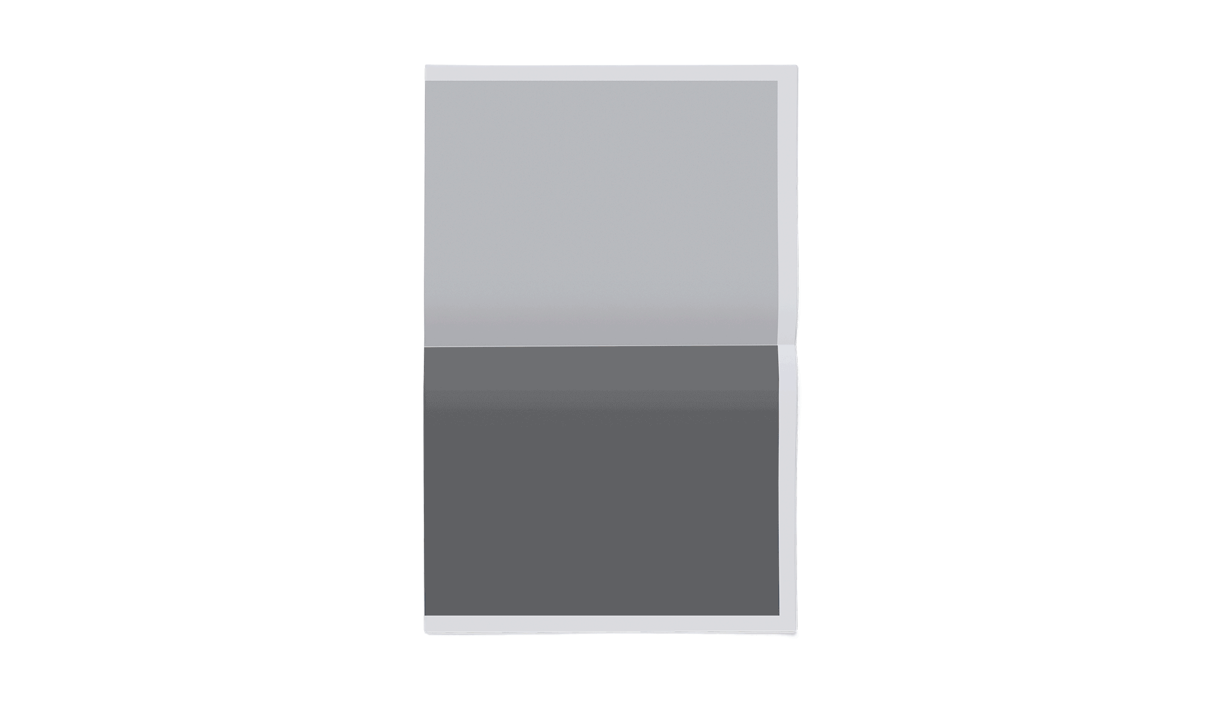 A blank, rectangular paper sheet is partially folded vertically, creating a slight shadow on the lower half. The background is plain and untextured. The top half of the sheet is lighter compared to the darker shadowed area below the fold.