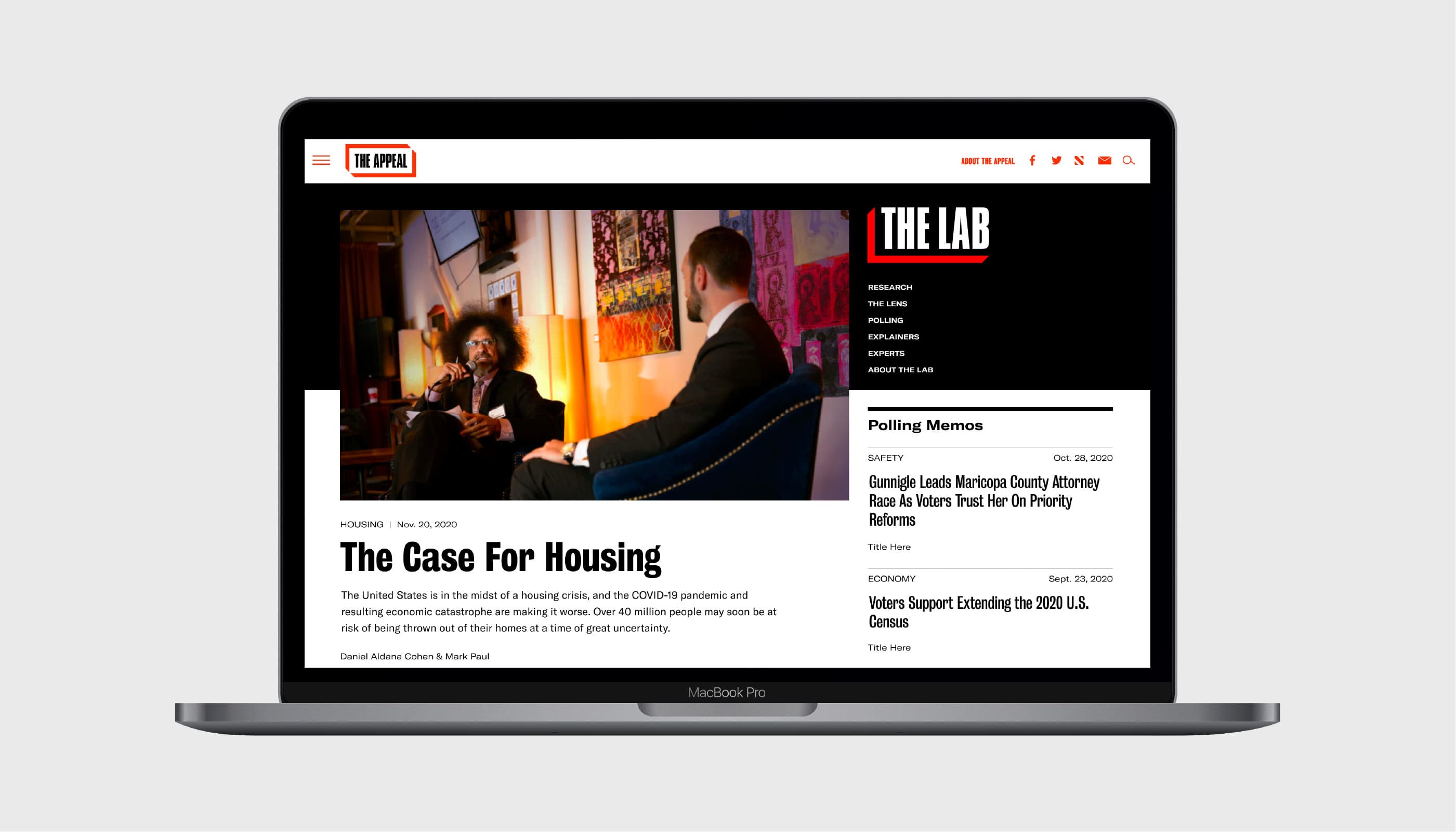 A MacBook Pro displays The Appeal website. The screen shows an article titled "The Case For Housing" with an image featuring two individuals in conversation. The sidebar includes sections named "The Lab" and "Polling Memos" with additional article titles and excerpts.