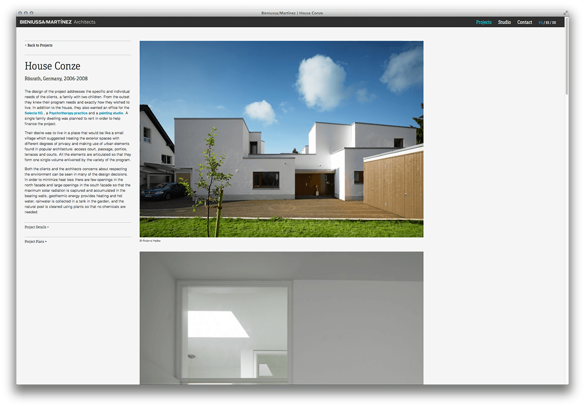 Screenshot of an architecture firm's webpage showcasing "House Conze" in Rhodes, Germany. The page features two images: an exterior view of the modern, white, minimalist house with a small tree and a garage; and an interior shot with a skylight. Text details the project.