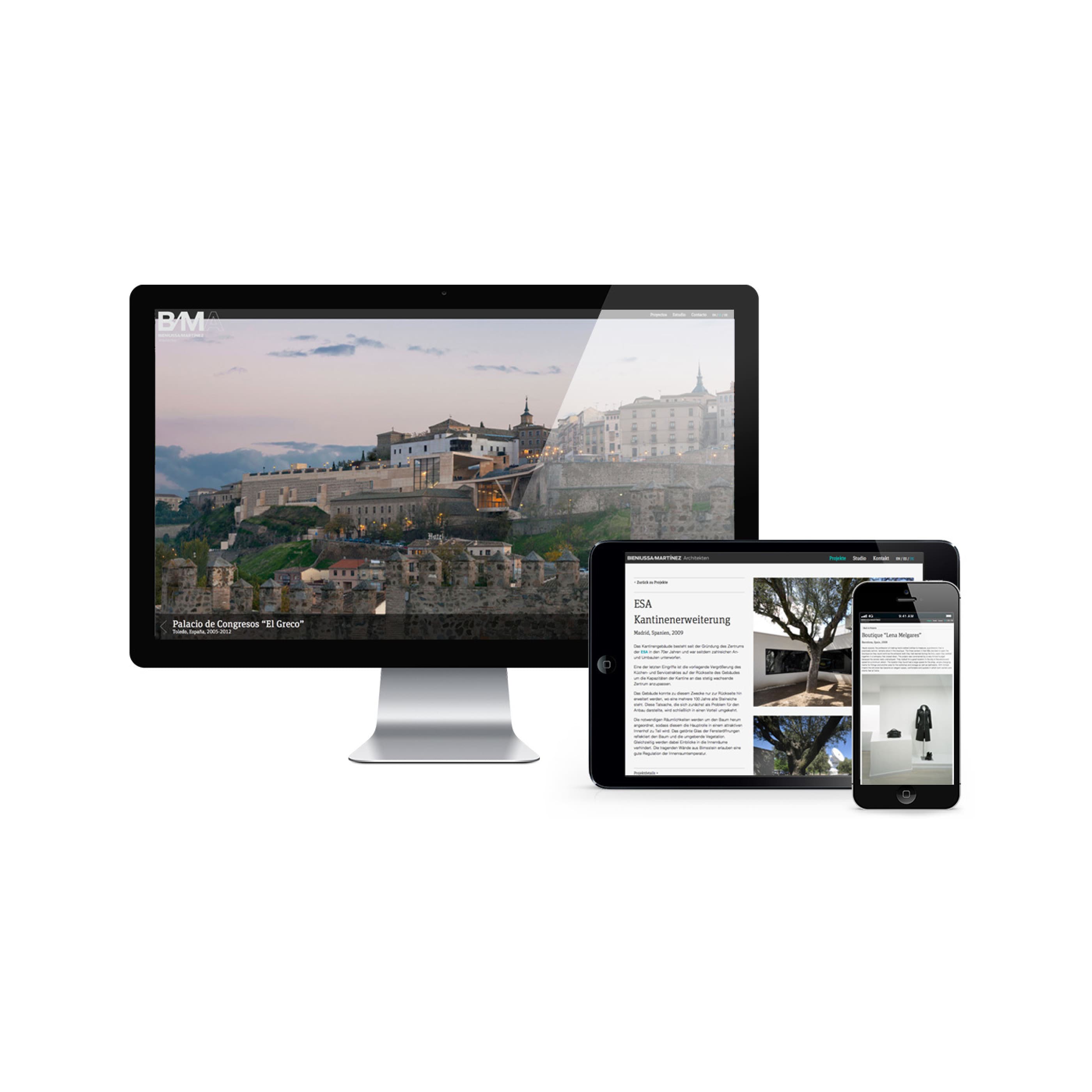 A computer monitor, tablet, and smartphone display different parts of a website. The monitor shows a landscape image of a historic building, while the tablet and smartphone display text and images on different website sections.