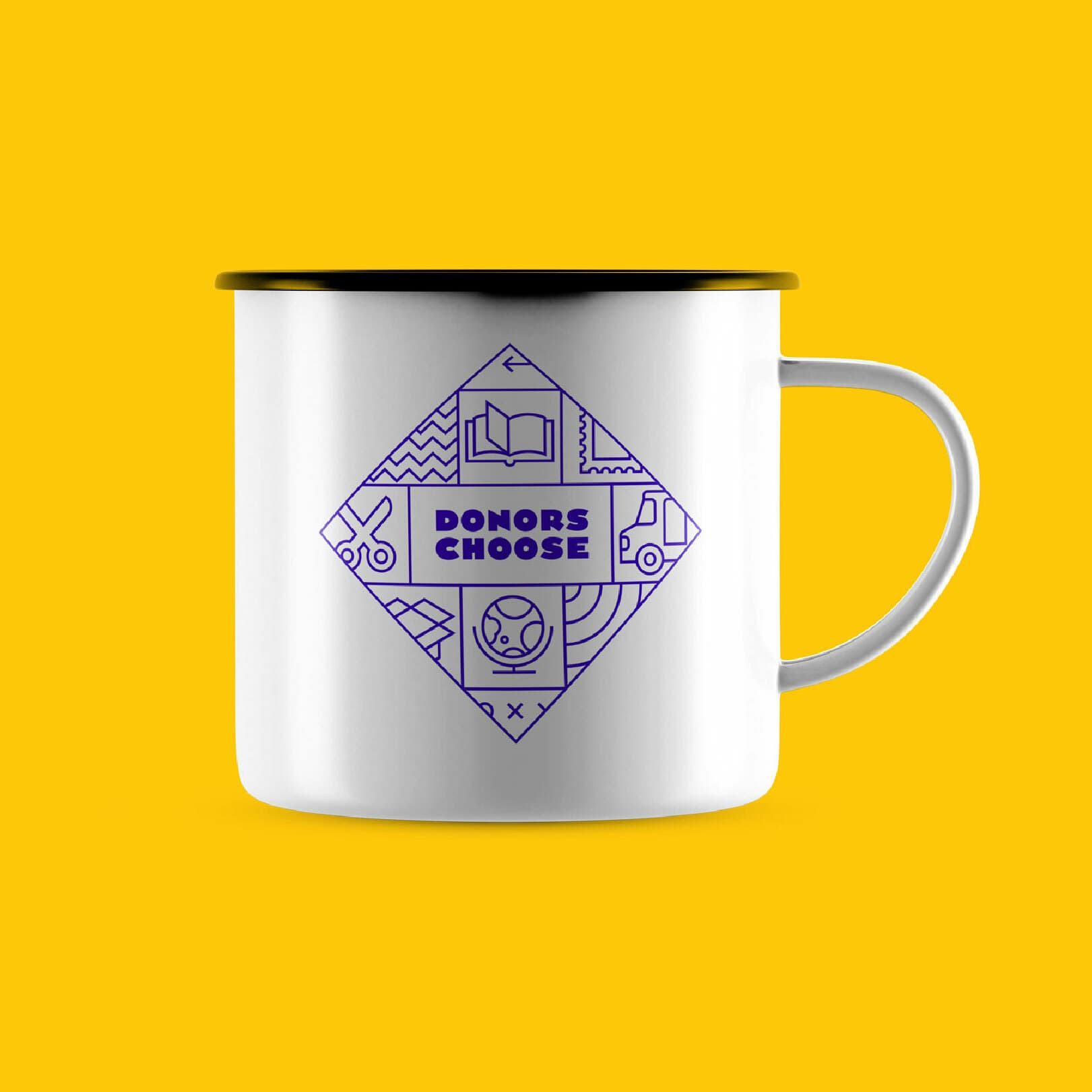 A white metal mug with a black rim is set against a yellow background. The mug features a purple diamond-shaped graphic with various icons and the words "Donors Choose" in the center.