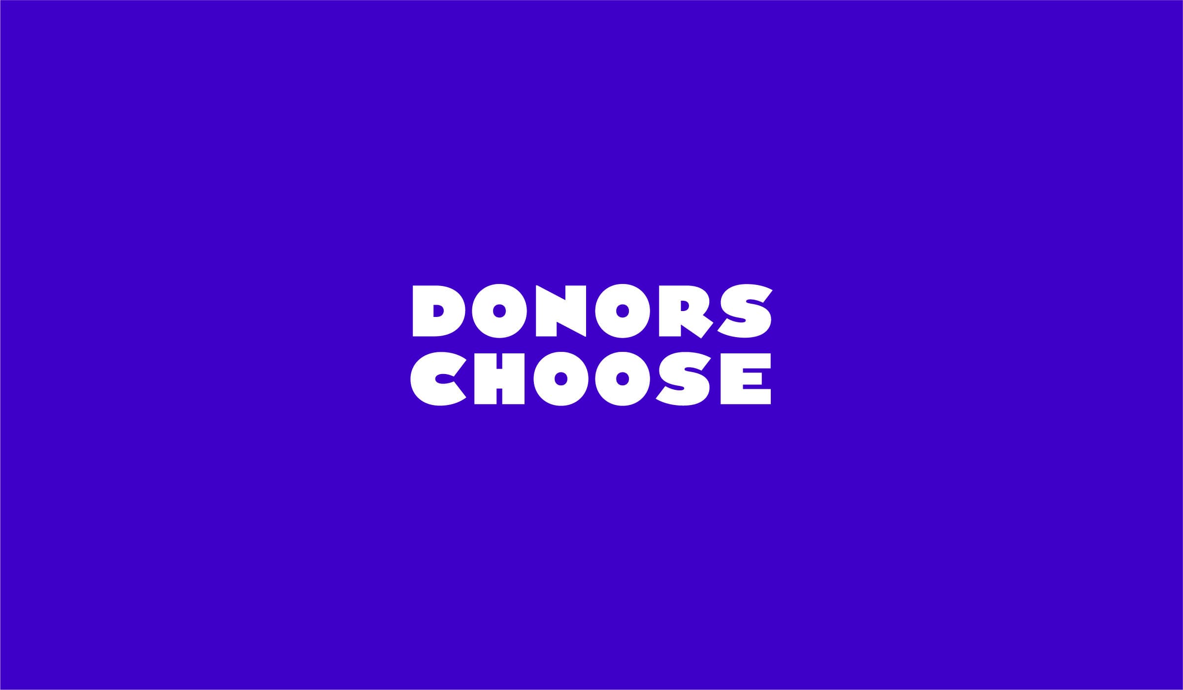 Text "DONORS CHOOSE" in bold, white uppercase letters against a solid purple background.