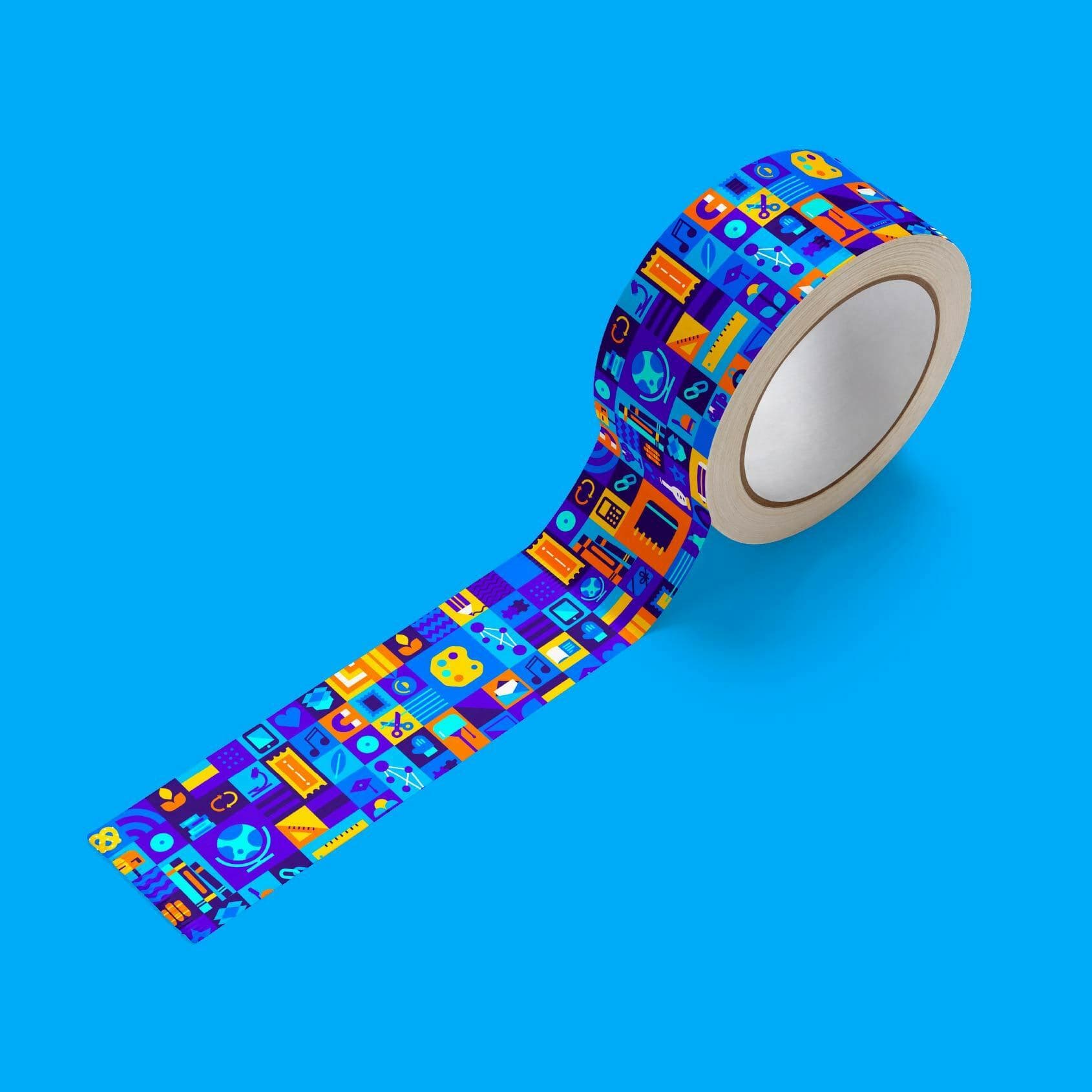 A roll of decorative tape against a vibrant blue background. The tape is unrolled and features colorful, geometric patterns with various symbols, shapes, and icons in shades of blue, yellow, orange, and red.