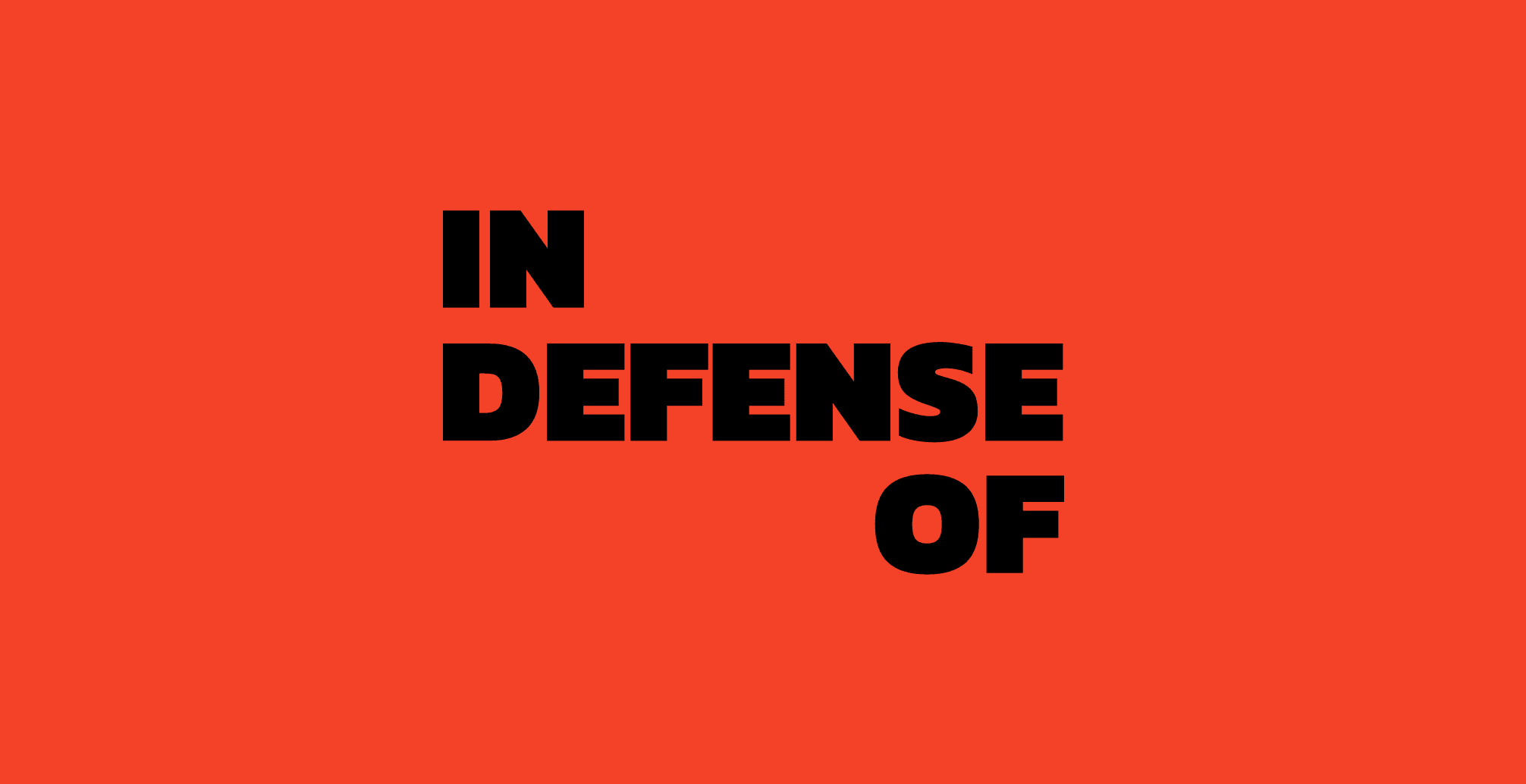 Bold black text on a red background that reads "IN DEFENSE OF" in three lines, with each word on a separate line.