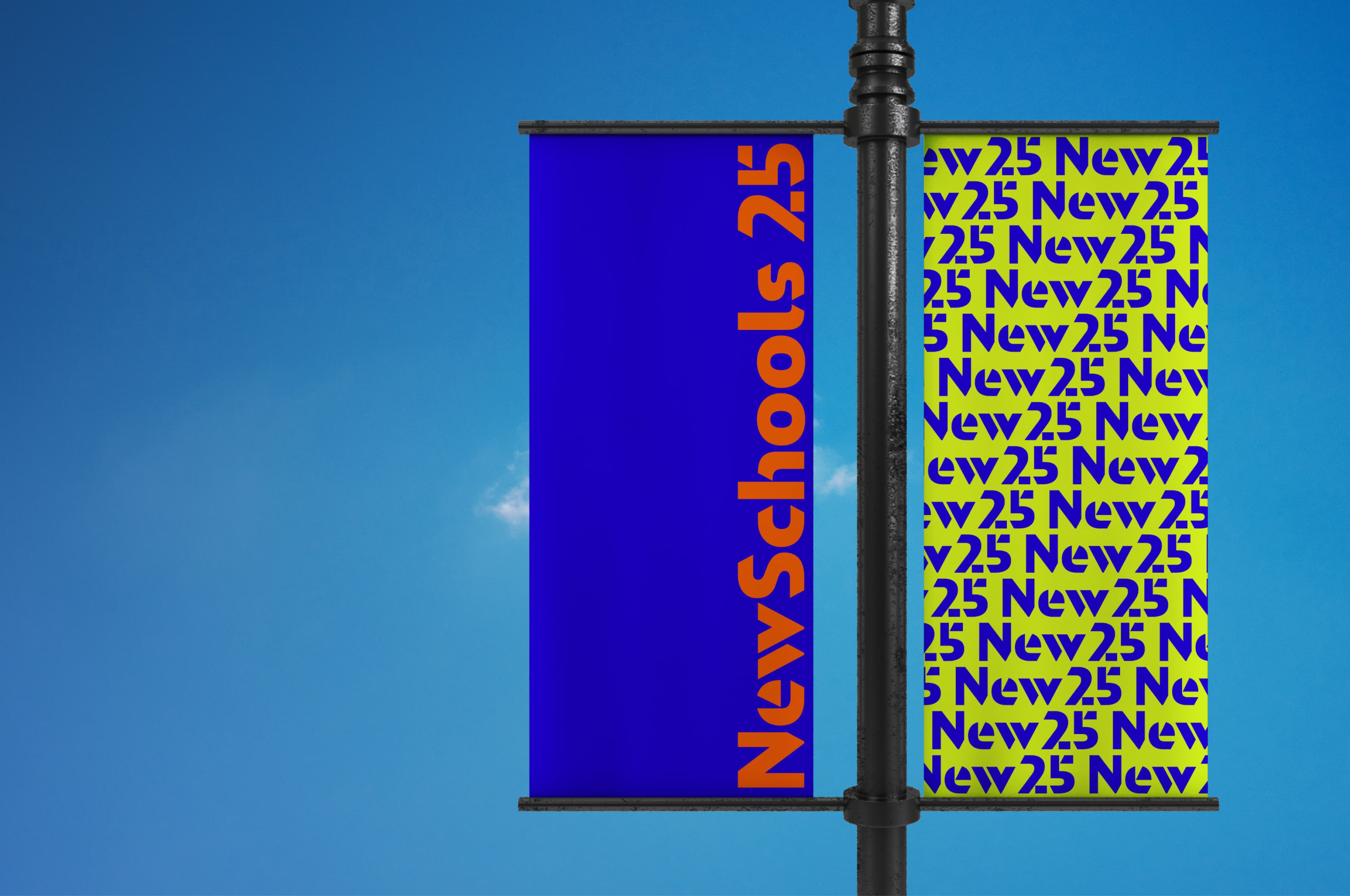A dual-sided street banner against a clear blue sky. One side is solid blue with the text "NewSchools 25" in large orange font. The other side is yellow, covered with a repeated "New 2.5" logo in various sizes.