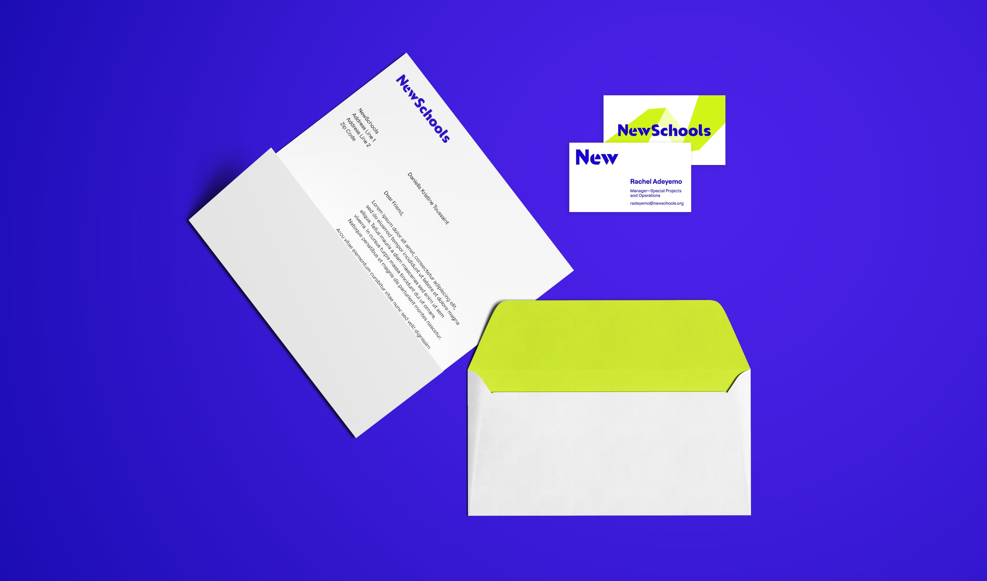 A purple background with stationary items: a white envelope with a green flap, a folded letter partially in the envelope, and two business cards displaying "NewSchools" in blue and green text. The letter also includes the "NewSchools" branding.