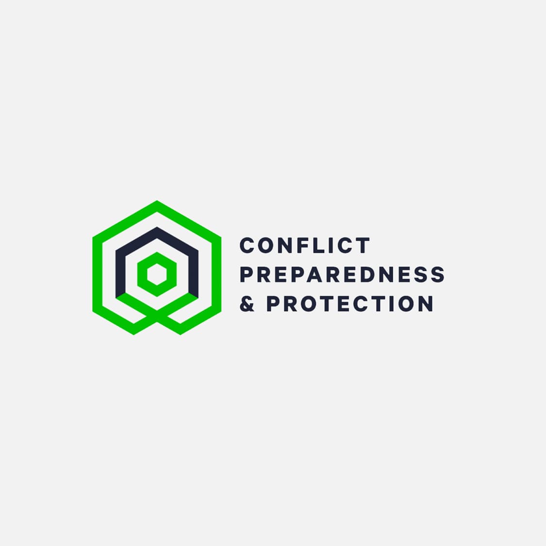 The image shows a logo of hexagonal shapes with a green outline, transitioning to grey and black towards the center. To the right of the hexagon, text reads "CONFLICT PREPAREDNESS & PROTECTION" in black uppercase letters. The background is white.