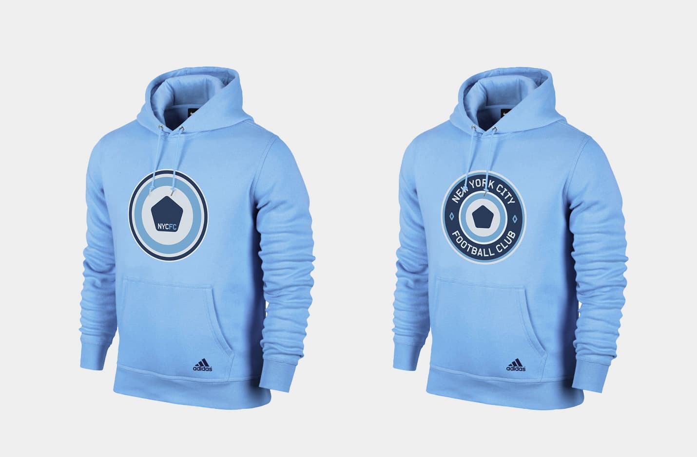 Two blue hoodies with the New York City Football Club logo, displayed side by side on a white background. Both feature the Adidas logo, front pockets, and drawstrings. One has a round emblem with a lighter blue circle, while the other showcases the full club name in text.