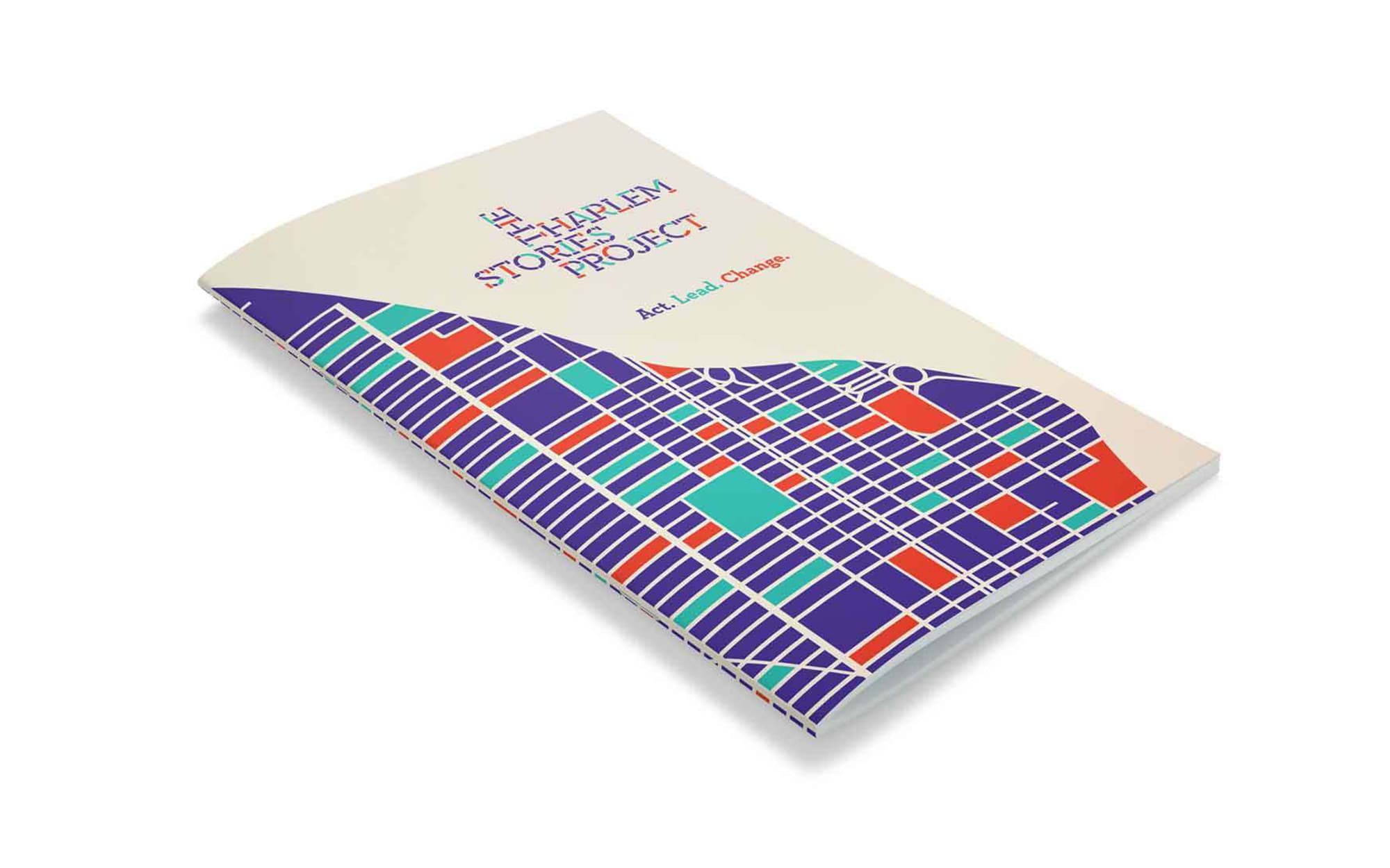 A booklet titled "The Harlem Story Project" with the tagline "Act. Lead. Change." is shown. The cover features a colorful, abstract map design in blue, red, and green geometric shapes. The booklet appears to be lying flat on a white surface.