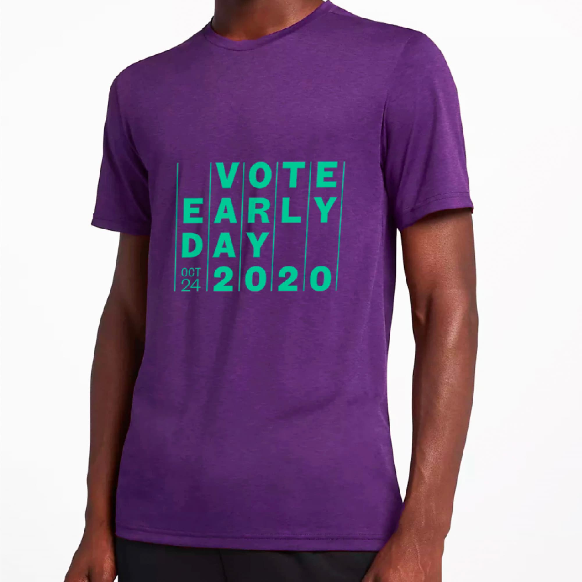 A person is wearing a purple T-shirt with the text "VOTE EARLY DAY 2020" in large green letters, and "OCT 24" in smaller green letters below "VOTE". The person is standing against a plain white background.