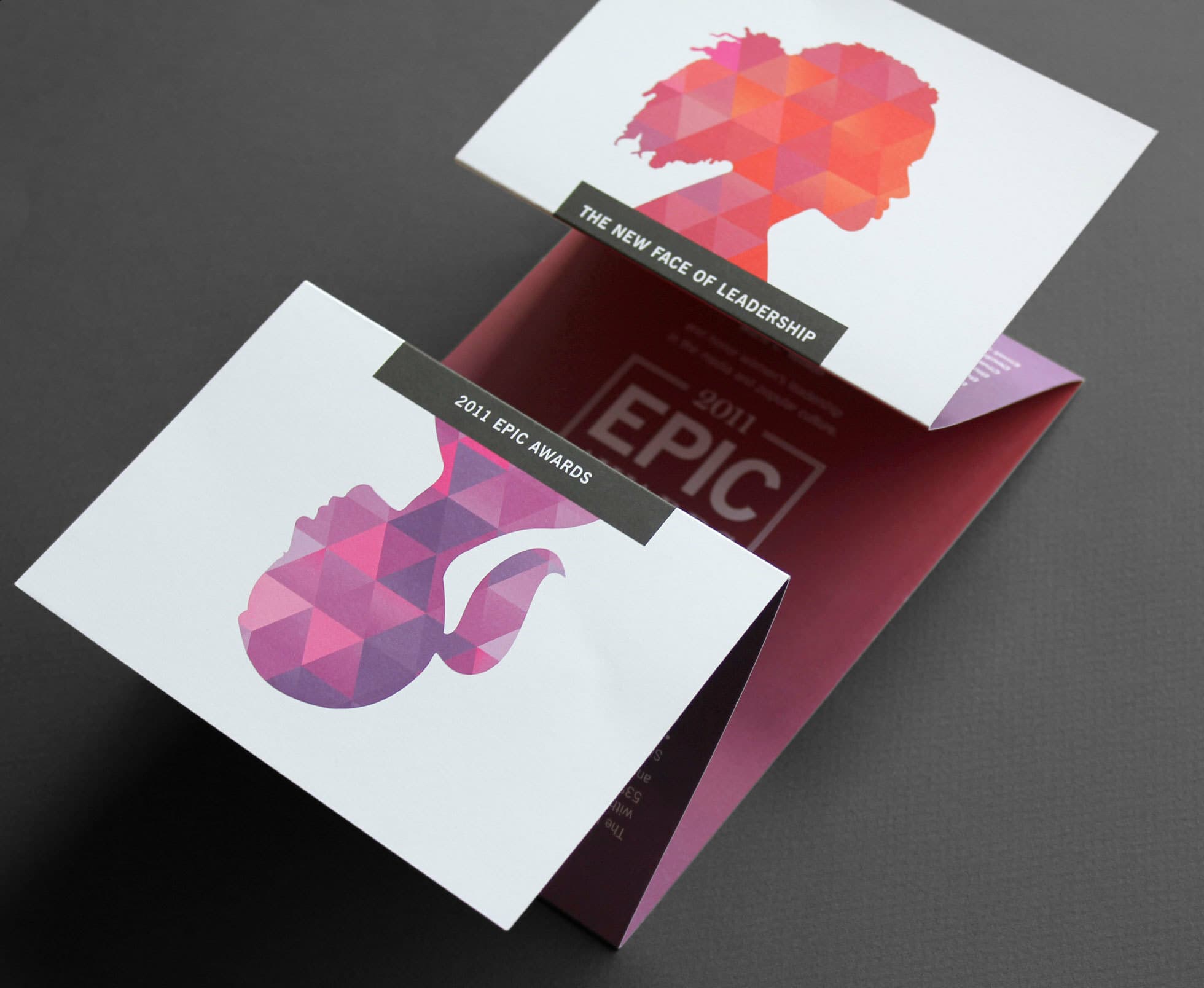 A folded brochure with a modern design featuring two silhouettes: one of a woman's head (side profile) on the front flap and another of a woman's head (side profile) upside down on the middle flap. The text reads "THE NEW FACE OF LEADERSHIP" and "2011 EPIC AWARDS.